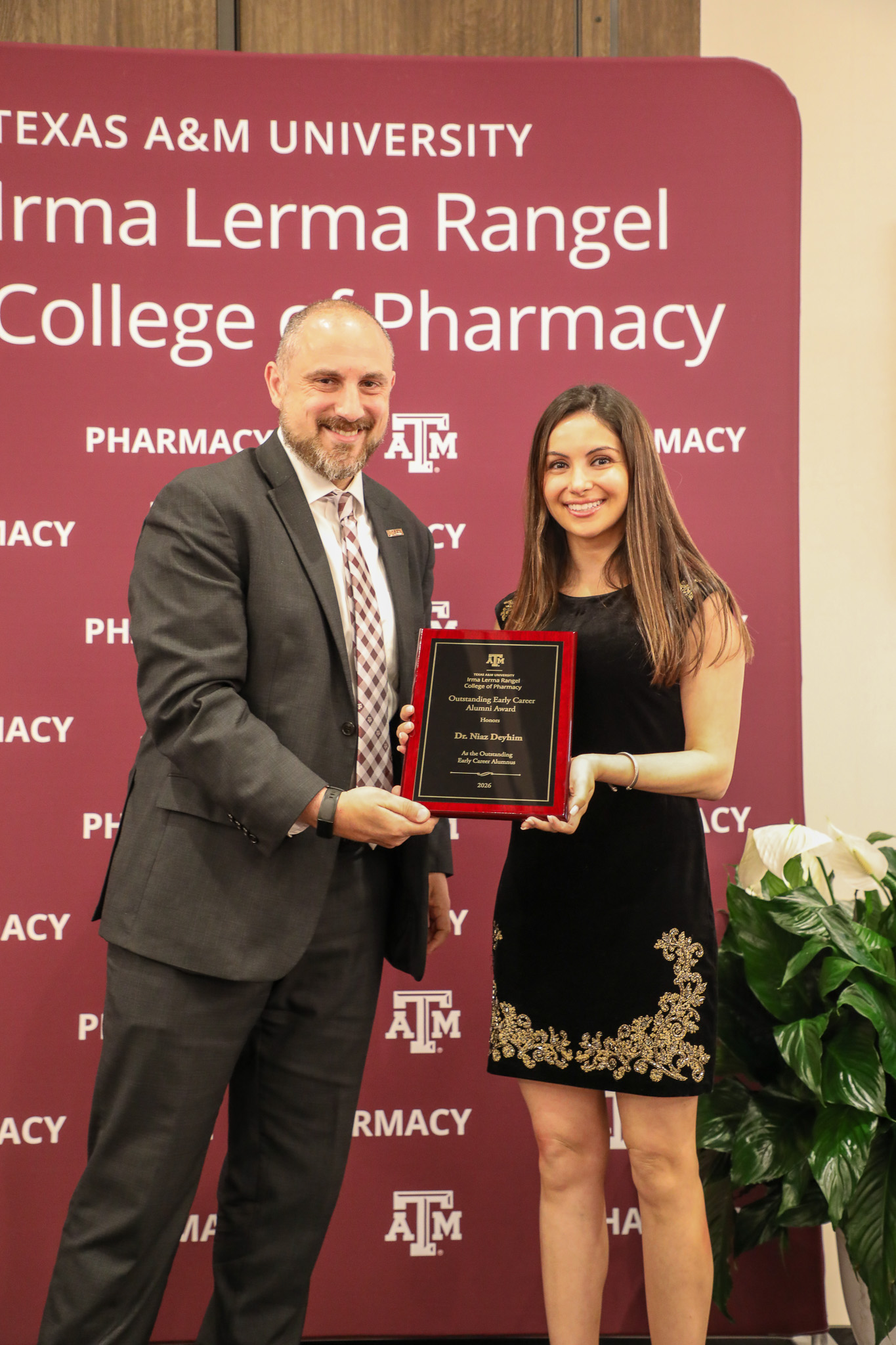 dr. diaz deyhim receiving an award