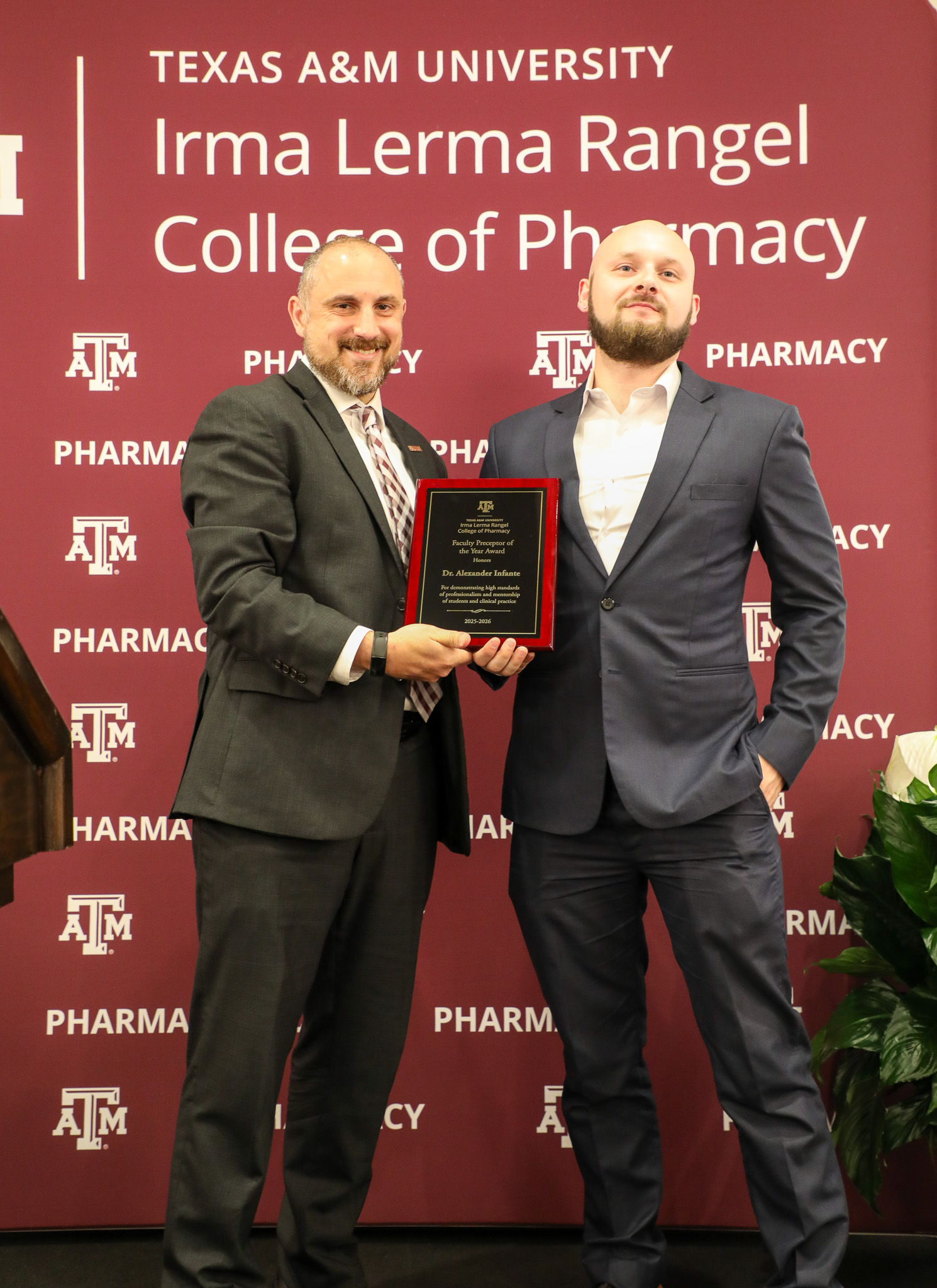 Dr. Infante receiving an award